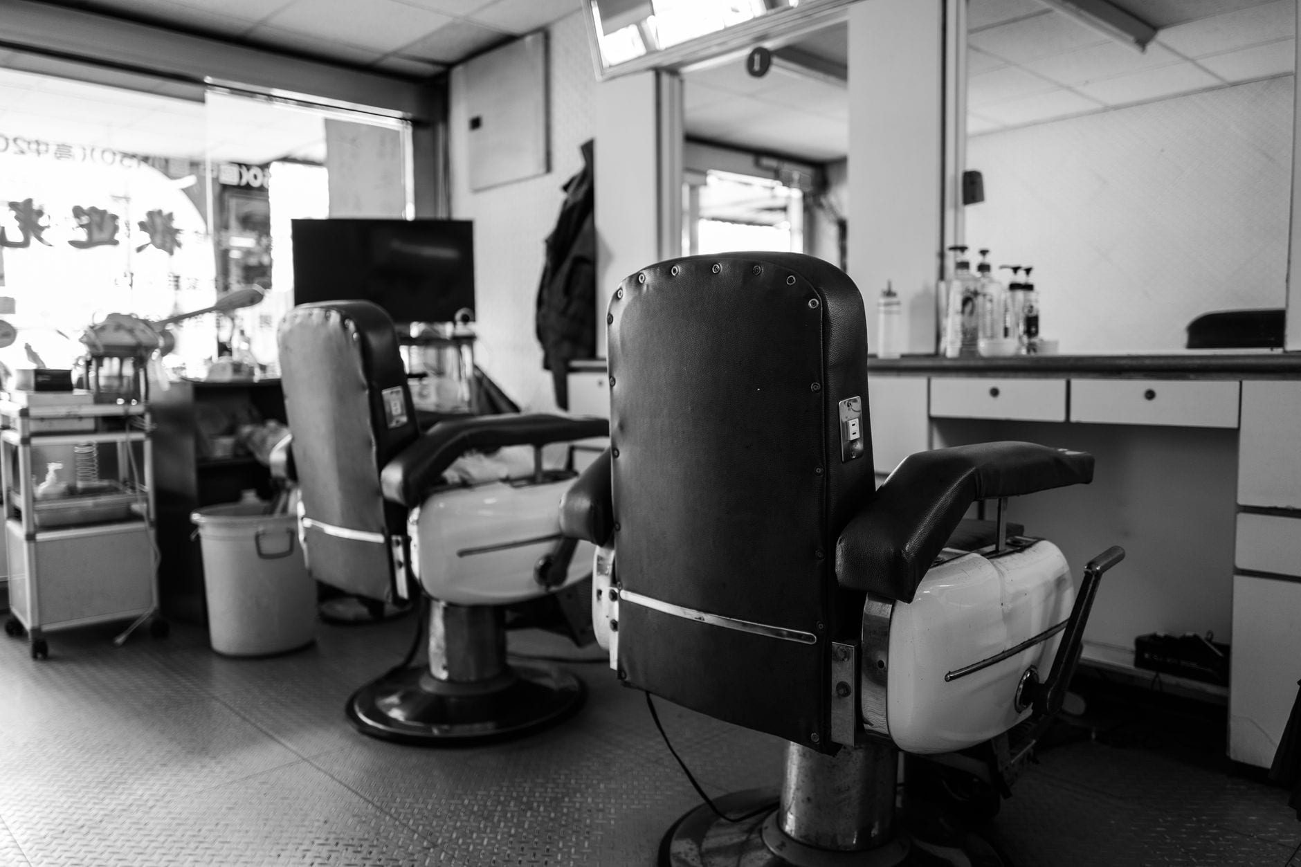 Classic barbershop interior with chairs and mirrors, similar to Rio's Barber Shop in Kitchener